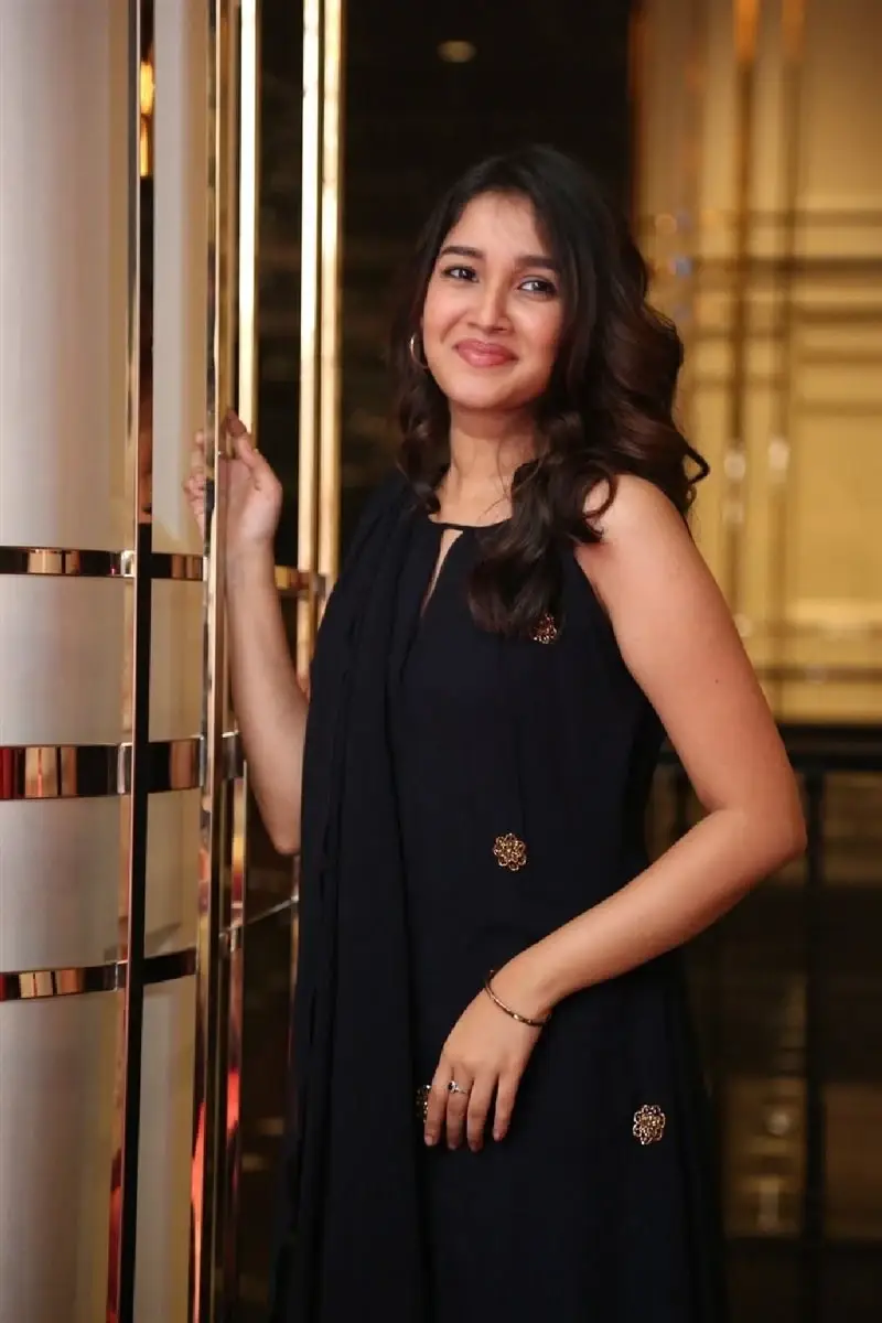 Actress Anikha Surendran in Black Dress at Butta Bomma Movie Trailer Launch